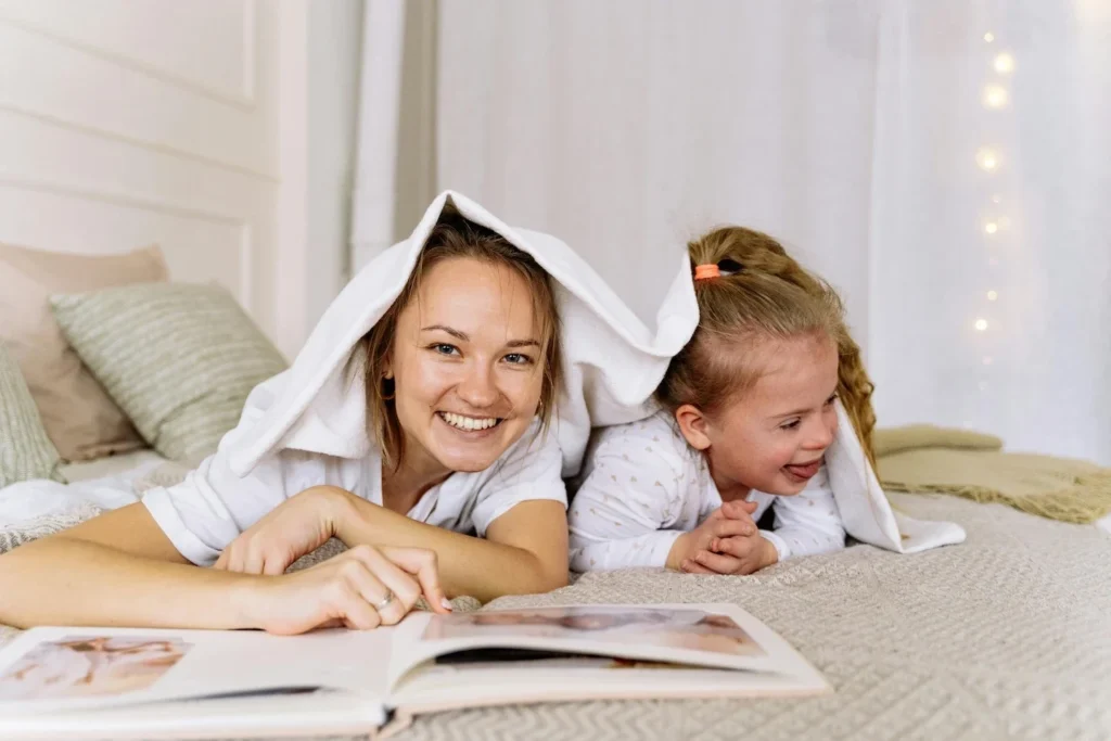 Briaud Girls under blanket