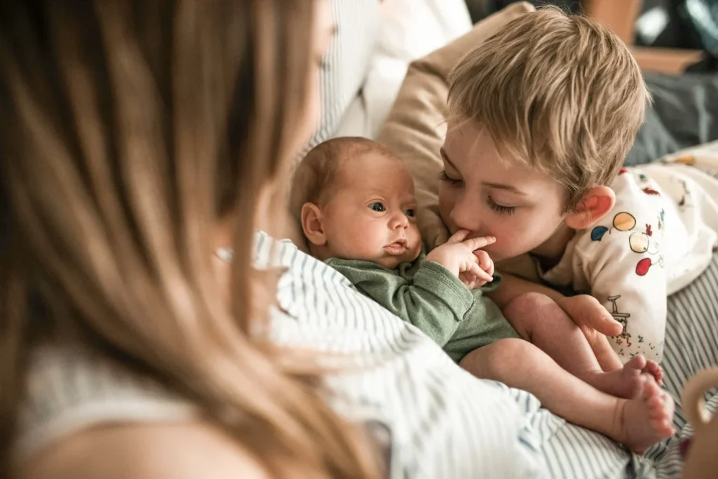 Newborn and brother